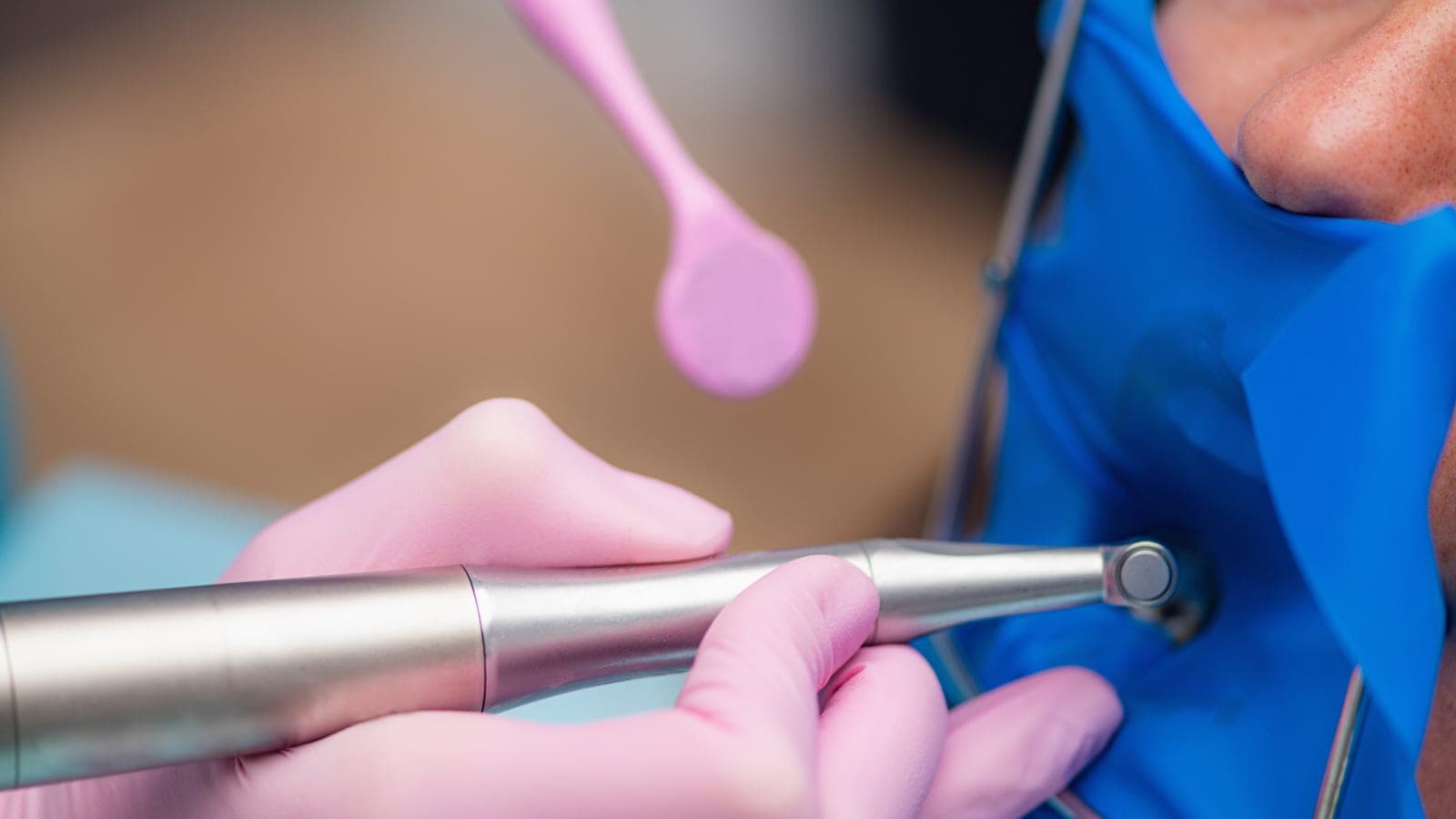 A hygienist providing a professional clean at AllClear Dental Centre