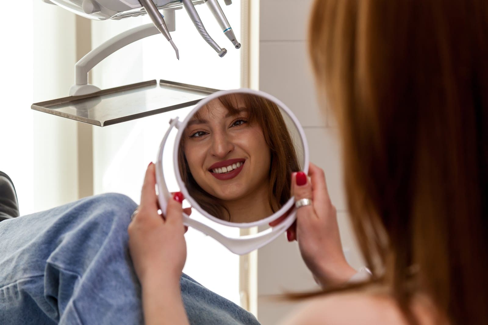 A patient with a brighter smile after professional teeth whitening